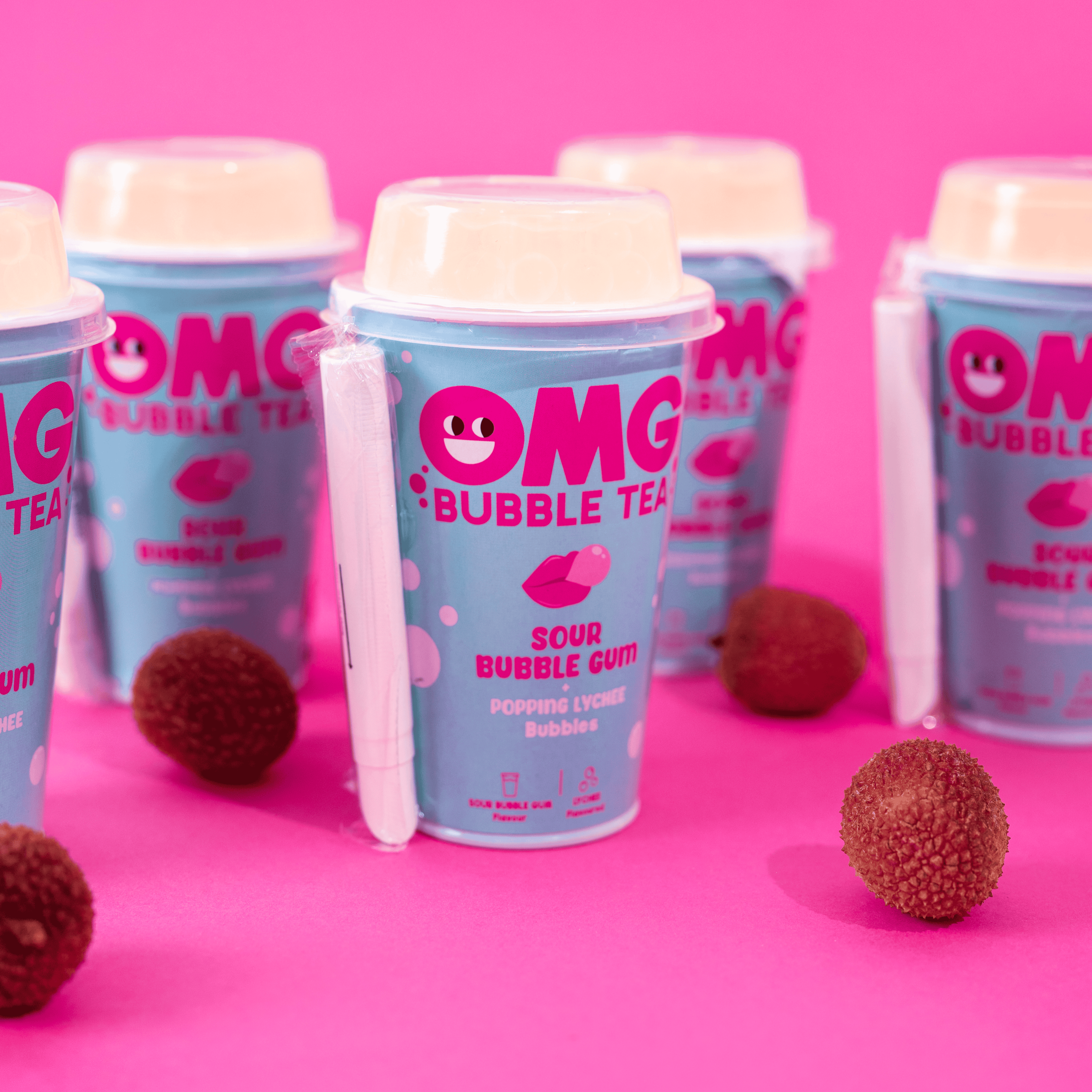 OMG Bubble Tea cups with pink text on a pink background